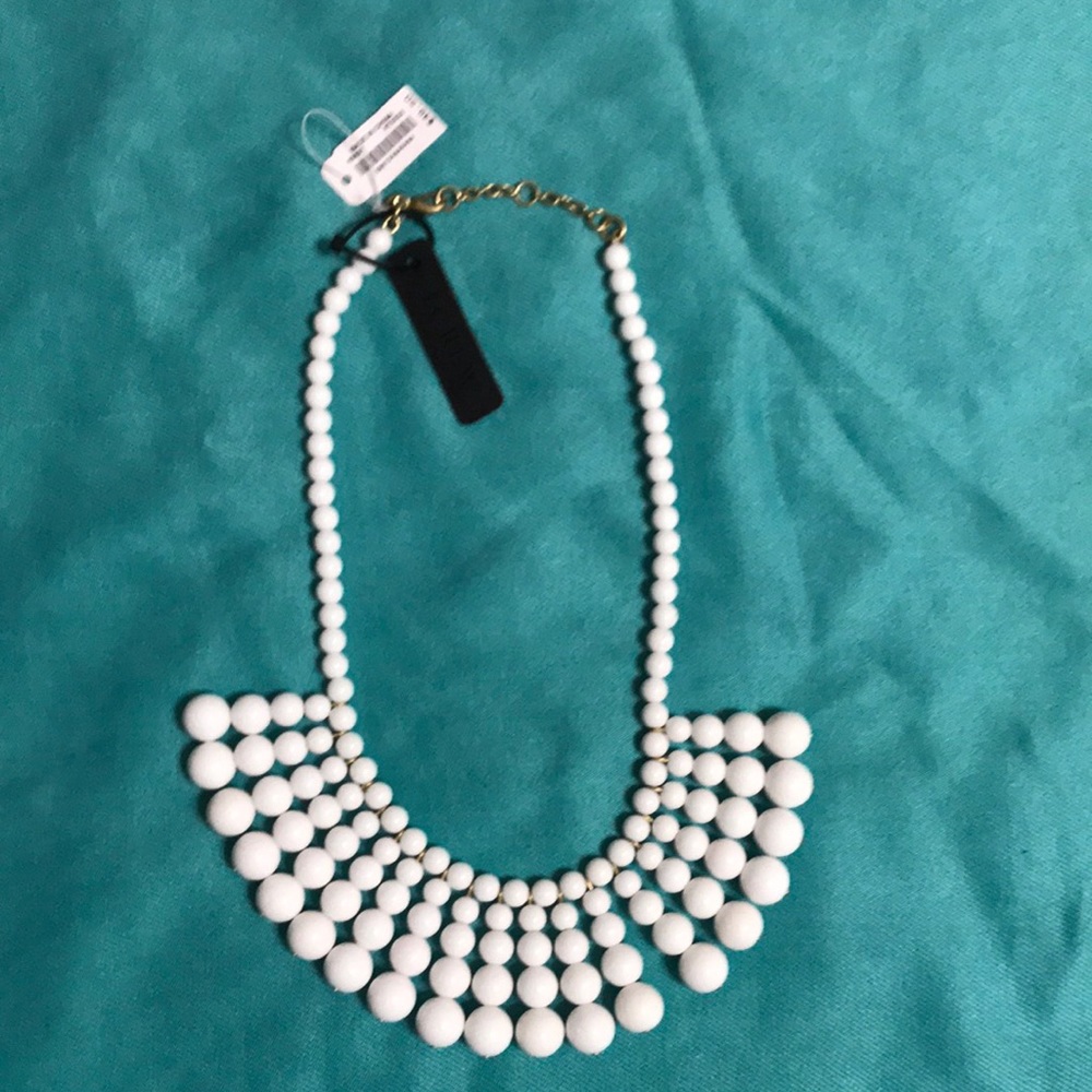J Crew white beaded fan necklace with gold tone chain/clasp.  NWT